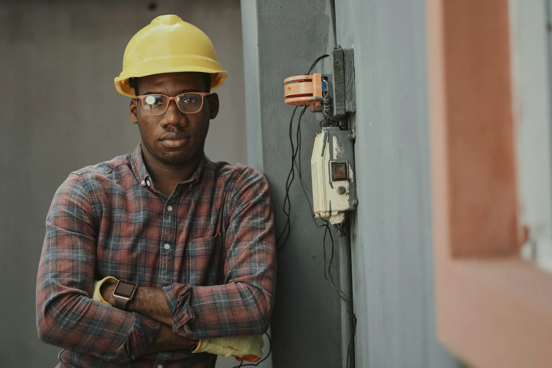young man in a yellow helmet